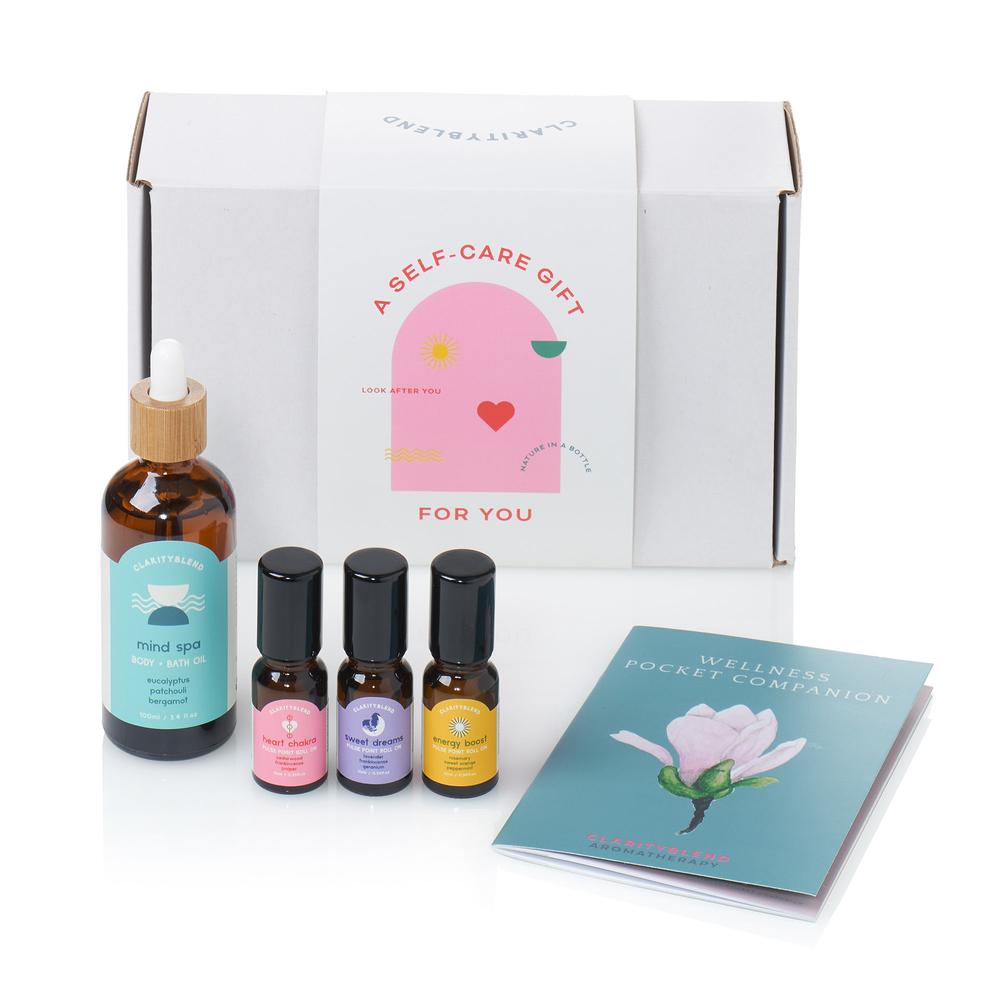self care kit with bottles of pulse point rolls ons