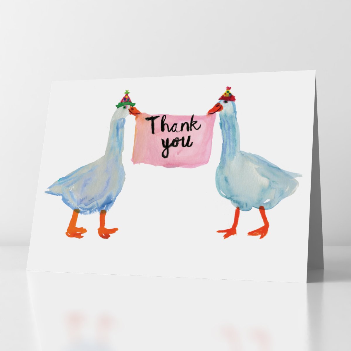 two geese holding thank you sign in their mouths 