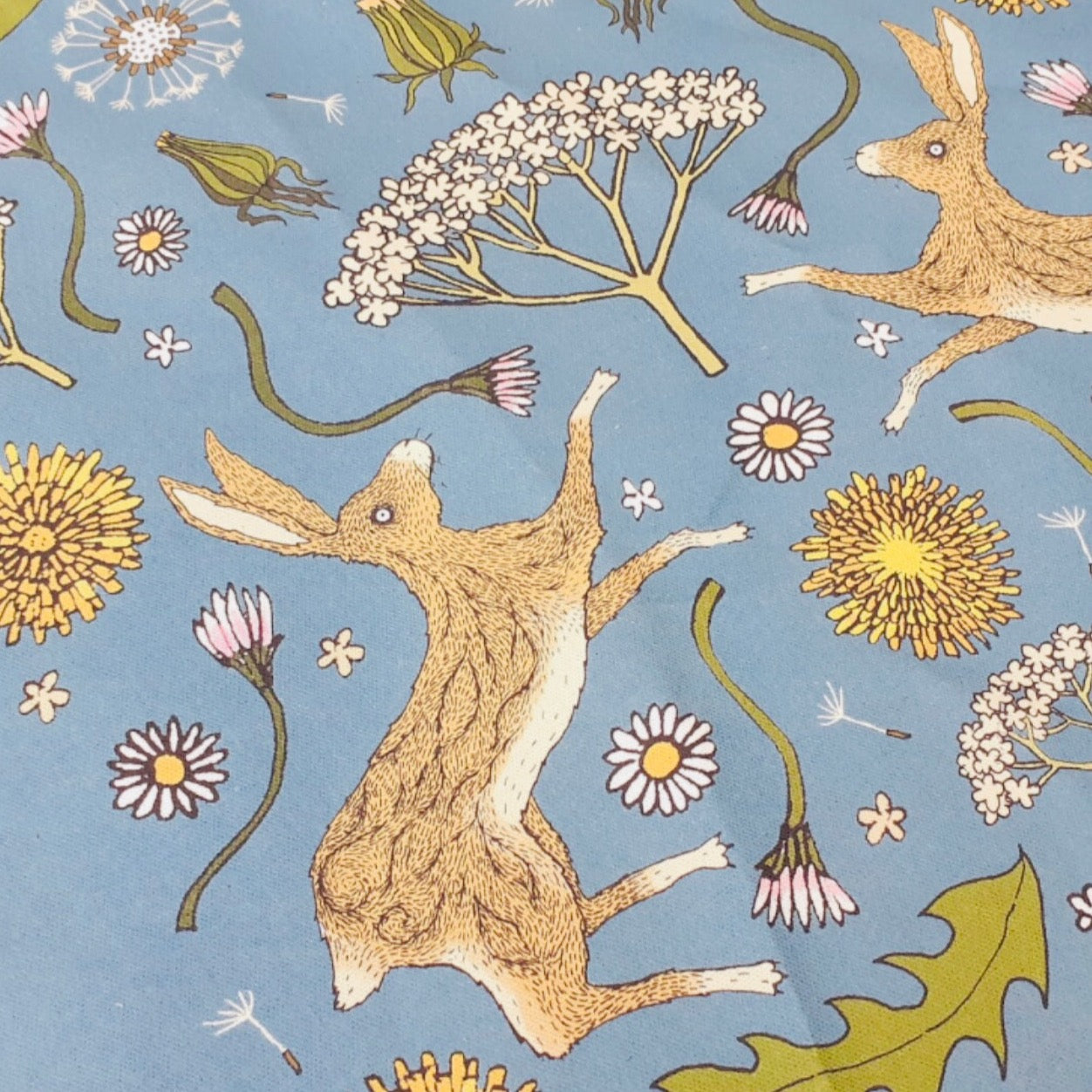 Hares in Springtime Blue Tea Towel