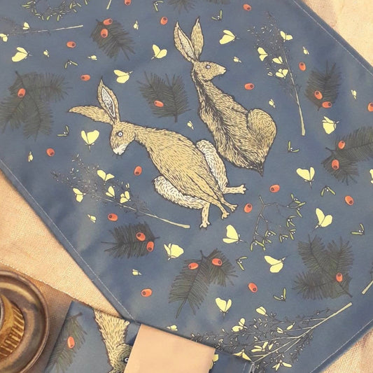 Blue Hares In Winter Tea Towel